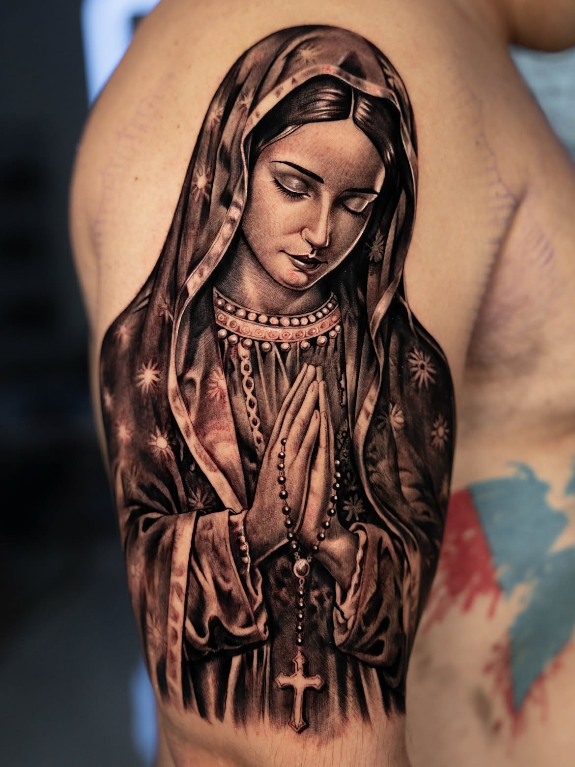 Black and grey tattoo by Robert Pho