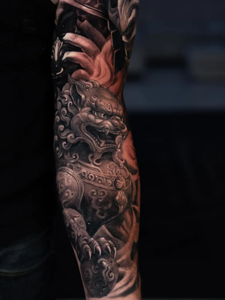Black and grey tattoo by Robert Pho